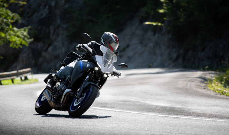 Is it legal to tow a motorcycle with a car